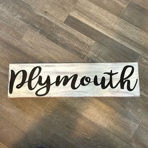 Plymouth wall sign